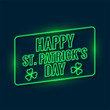 happy saint patricks day written with green neon light background