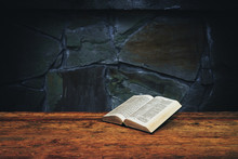 Bible On A Old Wooden Table Background.