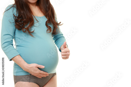 妊娠していることをアピールする水色のシャツを着た臨月の妊婦 Buy This Stock Photo And Explore Similar Images At Adobe Stock Adobe Stock 妊娠していることをアピールする水色のシャツを着た臨月の妊婦 Buy This Stock Photo And Explore Similar Images At Adobe Stock Adobe Stock