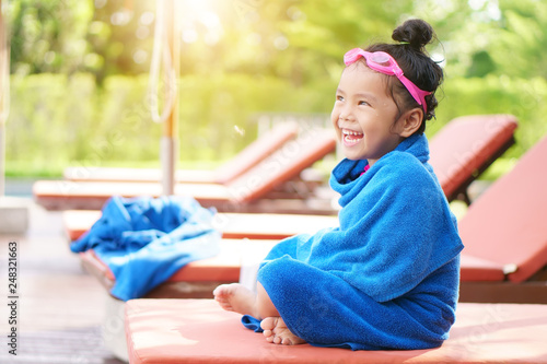 Asian Child Or Kid Girl Laugh Smiling With Wet Cold And Sit