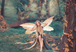 Leinwandbild Motiv charming fairy woke up in forest, sweetly smacks after sleeping