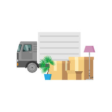 Personal Items Packed In Relocation Boxes With A Truck In The Background