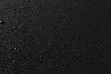 Wall Mural - Water droplets on black background and texture