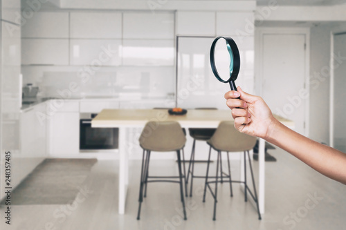 Fotografía Home inspection - magnifying glass inspector looking at kitchen house background