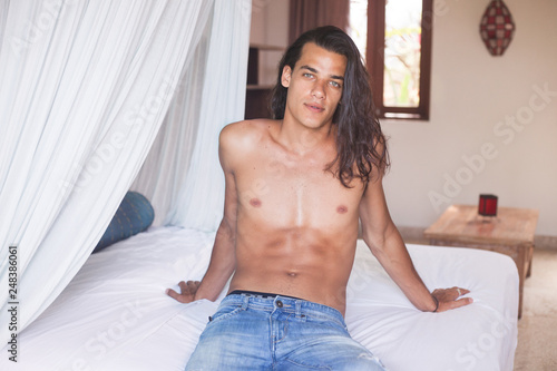 Attractive Handsome Young Man With Long Dark Hair And A Naked