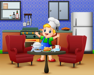 Wall Mural - Cartoon cute little boy in apron and chef's hat near dining table