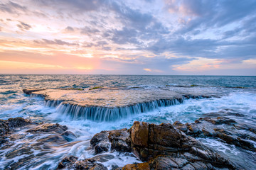 Wall Mural - Sunrise on volcanic rock beach, Ninh Thuan province, Vietnam.