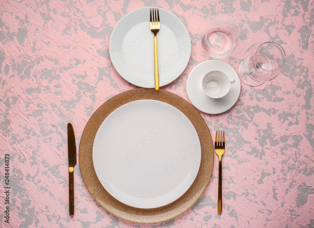 Simple table setting on color background