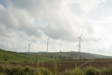 Wind farm. Wind turbines generating electricity