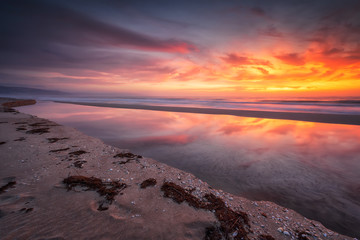 On the seashore at sunrise