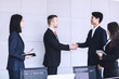 © khwanchai - shake hands and successful negotiation of business people