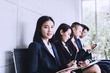 © khwanchai - group of people preparing interview and waiting in office