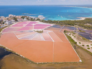 Wall Mural - Colonia Sant Jordi, Mallorca Spain. Amazing drone aerial landscape of the pink salt flats and the charming beach Estanys