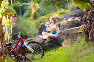 Wall Mural - Kids on bike. Child on bicycle. Kid cycling.