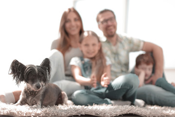 Wall Mural - background image of happy family with pet