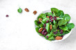 Spinach salad with pecan nuts and cranberries