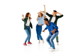 group of cheerful young people men and women isolated on white background.