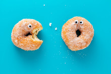 Funny Doughnuts With Eyes, Cartoon Like Characters, On Blue Background.