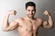 © FotoAndalucia - Strong attractive man posing and showing muscle looking at camera