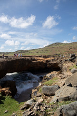 Wall Mural - Aruba's Natural Bridge and the coastline around it