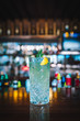 © Hakan Tanak - Green Alcoholic Cocktail Drink on the Bar Desk
