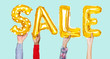 © Rawpixel.com - Hands holding sale word in balloon letters