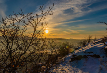 Wall Mural - Sunrise on Boren hill near Bilina town in winter frosty morning