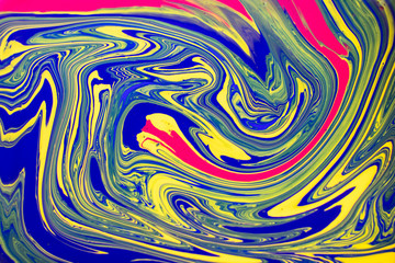  Abstract background with psychedelic vivid colors. Marbleized bright effect with fluid painting, background for wallpapers, poster, postcard. Swirls and lines with yellow, blue, purple and magenta.