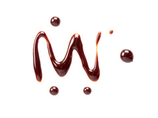 Chocolate sauce on white. Abstract lines made of chocolate or soy sauce isolated on white background