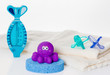 © Zoja - Still life with baby hygiene and bath items,    towel, pacifier, rubber toy, thermometer