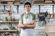 © dima - Master carpenter in an apron in his workshop. Small business