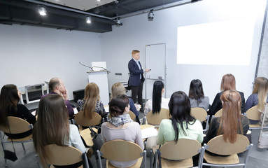 Manager makes a presentation to his business team