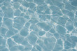 © apimook - Surface of blue swimming pool texture, background of water in swimming pool