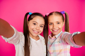 Poster - Close up photo two small little age she her girls tell talk speak skype glad to see parents summer camp wearing casual jeans denim checkered plaid shirts isolated rose vibrant bright background