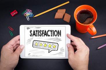 Satisfaction concept. Text and icon on tablet device