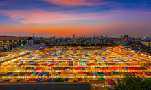 Sunset Over Bangkok City Business Downtown And Train Night Market Ratchada.