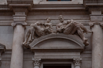 Wall Mural - Eighth marble trabeation of the Palazzo Nuovo, Mai library in Bergamo, Italy. Detail of the ornamental marble statues, works by Tobia Vescovi.