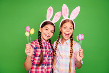 Close Up Photo Portrait Of Cheerful Amazed Astonished Pretty Beautiful In Checkered Plaid Bright Shirts Holding Chocolate Eggs In Hands Isolated Bright Vivid Background