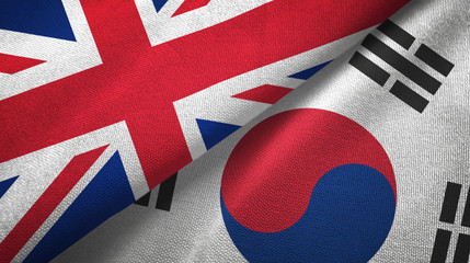 United Kingdom and South Korea two flags textile cloth, fabric texture