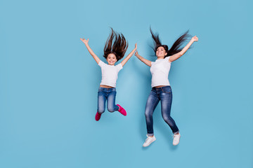 Poster - Full length body size view of two nice free lovely attractive adorable cheerful cheery slim sporty careless carefree people in white t-shirt rejoice isolated over blue pastel background