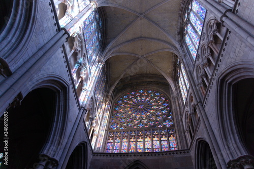 Looking Up At Arched Ceilings And Stained Glass Arches In French