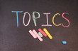 topics handwritten with colorful chalk