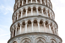 Close-up Columns Of 14th Century Leaning Tower Of Pisa, Italy. UNESCO World Heritage Site