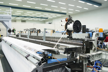 Weaving automatic machines - Weaving is a method of textile production in which two distinct sets of yarns or threads are interlaced at right angles to form a fabric or cloth.