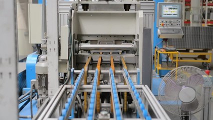 Wall Mural - Roller forming machine. The interior of the plant producing a metal profile.