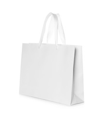 Sticker - Paper shopping bag isolated on white. Mock up for design