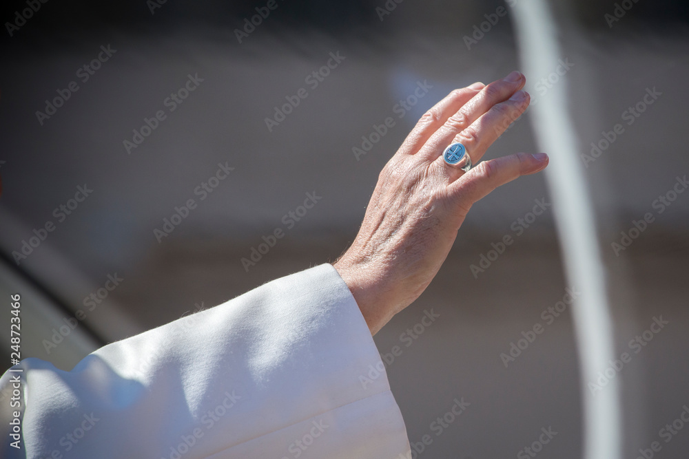 Vatican City, April 19, 2017: Pope Francis blesses the crowd at the end of his weekly general audience in Saint Peter's Square at the Vatican - obrazy, fototapety, plakaty 