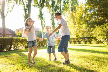 happy children play on the lawn