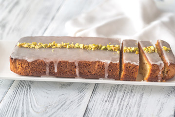 Canvas Print - Lemon cake decorated with pistachios