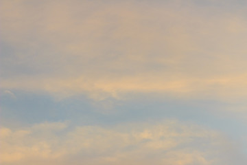 Wall Mural - Colorful with red, orange and blue dramatic sky on the clouds for abstract background. Romantic sunset background with beautiful blue, red and yellow clouds.